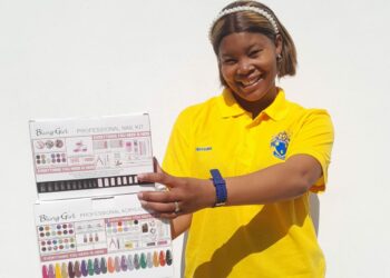 Raina Khoza, one of the recipients, showcasing a meticulously curated nail kit she will utilising in her entrepreneurial endeavors post the program.