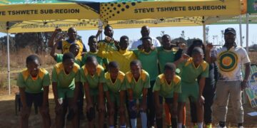 Behind the soccer team (left to right) Ahmed Mahlangu (volunteer), Mhlonishwa Masilela (Steve Tshwete mayor), Sello Matshoga (Nkangala regional secretary), Poppy Msiza (Thembisile Hani municipality speaker) and Sihle Mashilwane (Steve Tshwete council whip)